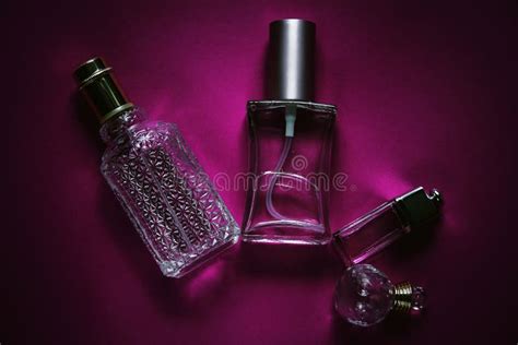 Bottles Of Perfume In Pink Background Stock Photo - Image of fragrance, aroma: 75861480