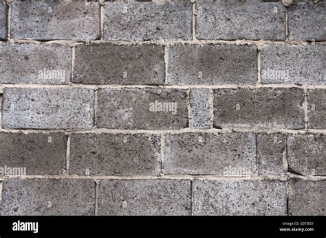 Old concrete brick wall texture background Stock Photo - Alamy