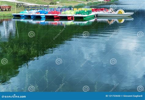 Colorful Pedalos on a Mountain Lake with Reflections Stock Photo - Image of travel, colorful ...