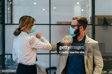 Business People Greeting During Covid19 Pandemic High-Res Stock Photo - Getty Images