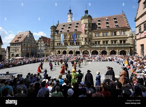 medieval festival parade Meistertrunk in ancient old city Rothenburg ob ...