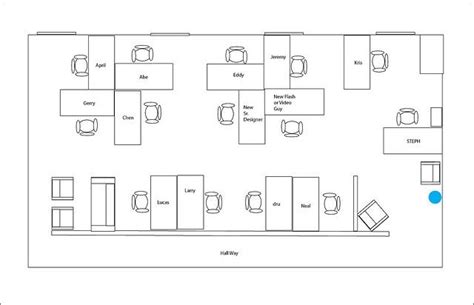 the floor plan for an office with several cubicles and desks on each side