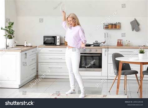 Stressed Young Woman Breaking Dishes Home Stock Photo 2092128106 ...