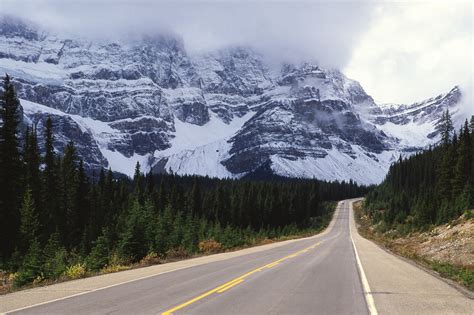 Snowy Mountains Behind Road