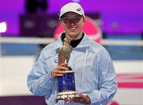 Dominant Swiatek wins second straight Doha title | Reuters