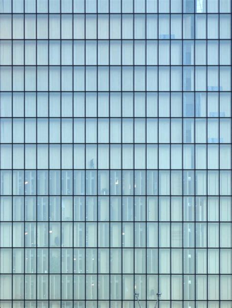 Glass Building Facade with Green Texture