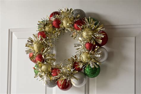 How to Make a Christmas Wreath out of a Coat Hanger by Putting ...