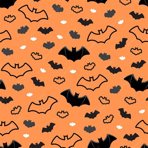 Premium Vector | Halloween bats repeatable pattern on orange background