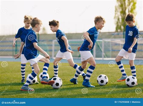 Kids Sports: Teaching Children To Improve Soccer Skills. Football Camp for Kids Stock Photo ...