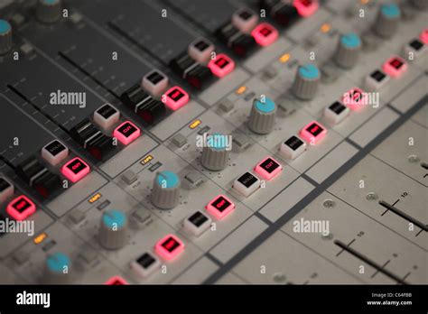 Recording studio mixing board console Stock Photo - Alamy