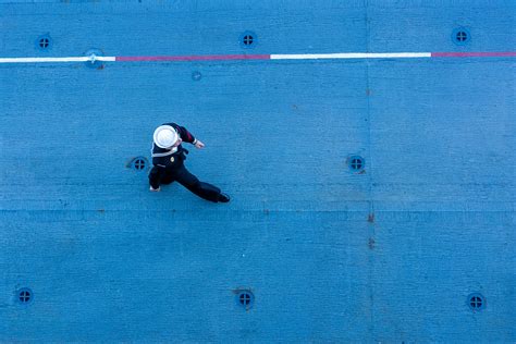 Sailor Walking on a Ships Deck · Free Stock Photo