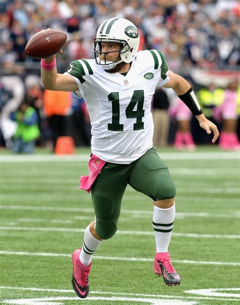 Ryan Fitzpatrick #14 of the New York Jets carries the ball during the ...