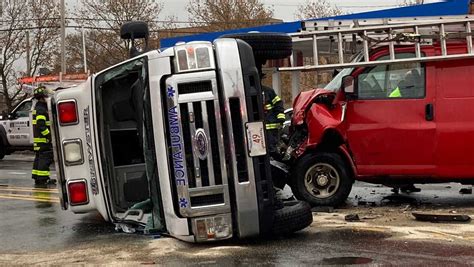 Ambulance rolls onto its side following Brockton collision