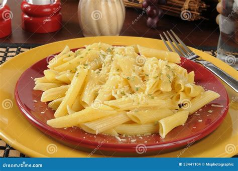 Buttered Penne Rigate Noodles with Parmesan Cheese Stock Photo - Image of buttered, product ...