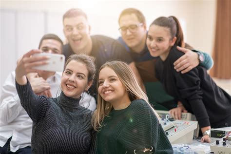 young happy students doing selfie picture 12689269 Stock Photo at Vecteezy