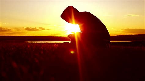 Silhouette Of Man Praying At Sunset Concept Stock Footage SBV-314362140 ...