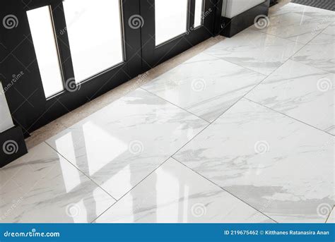 Marble Floor Tiles in the Glass Door Stock Photo - Image of glass, marble: 219675462