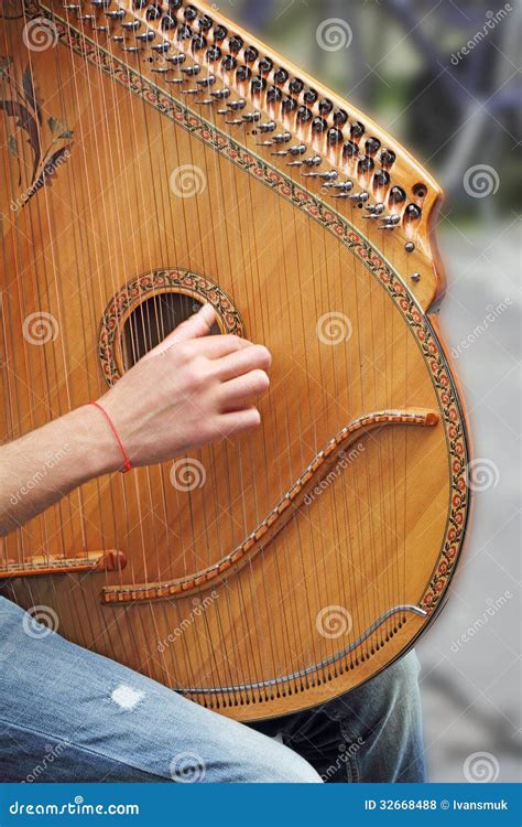 Lute Player stock photo. Image of acoustic, instrument - 32668488