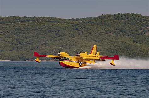 Turbo Prop Firefighting Ai Canadair Water Bomber In Yellow And Red ...