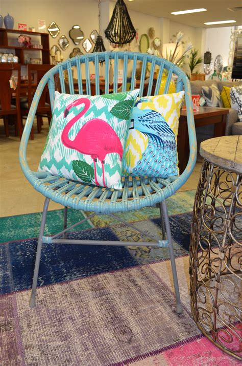 Flamingo fun! Quirky cushions and an aqua rattan chair....The General ...