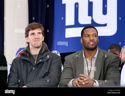 Eli Manning and Michael Strahan New York Giants victory ticker tape parade to celebrate winning ...