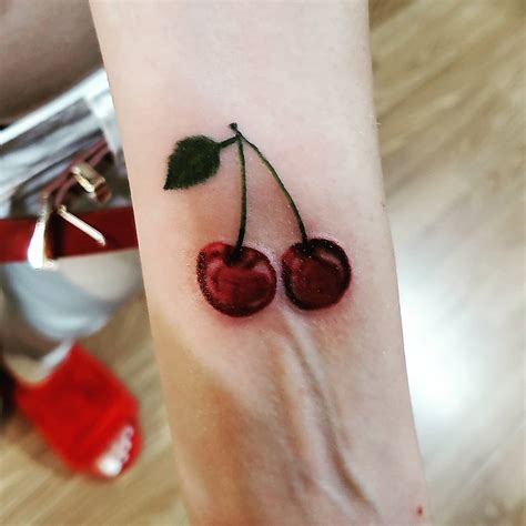 Creative Cherry Tattoo Designs Featuring Unique Fruit Imagery