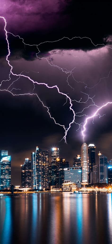 lightning storm over skyscrapers iPhone X Wallpapers Free Download