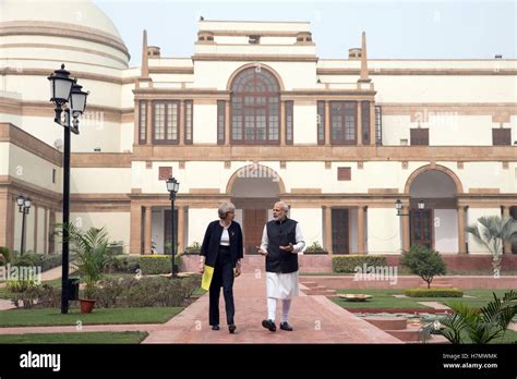 Prime Minister Theresa May and Indian Prime Minister Narendra Modi walk ...