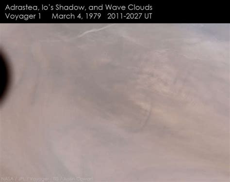 Adrastea, Io's shadow, and wave clouds on… | The Planetary Society