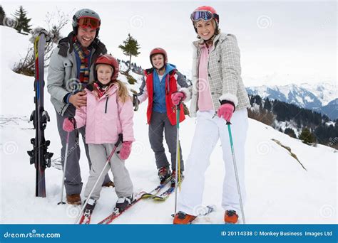 Young Family on Ski Vacation Stock Photo - Image of looking, good: 20114338