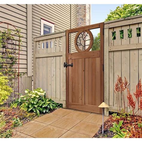 3.5 ft. W x 6 ft. H Cedar Fence Gate with Round Metal Art Insert-201568 ...