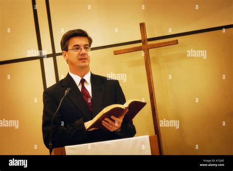 Pastor preaching from pulpit Stock Photo - Alamy