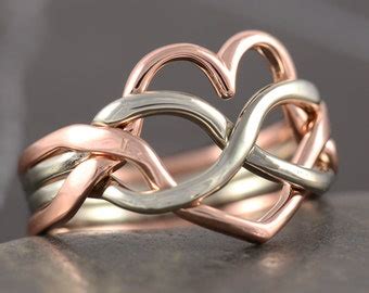 Heart shaped puzzle ring in sterling silver with natural