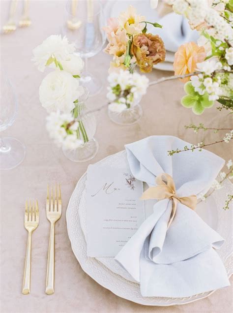 8 Pretty Ways to Fold Napkins At Your Wedding Reception | Wedding table settings, Wedding place ...