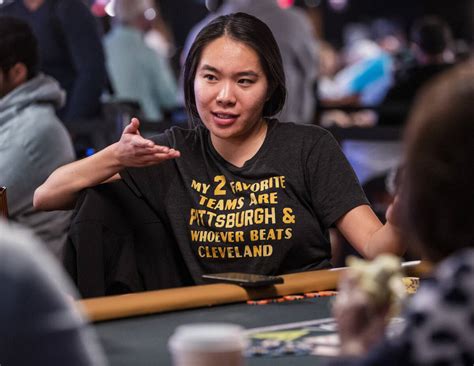 Lynne Ji of Los Angeles chats with other players at her table during ...