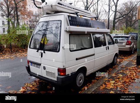 A camper van with solar panels parked in a Berlin street Stock Photo ...