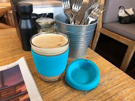 The new glass reusable coffee cup in action #waronwasteau Take Away Cup, Reusable Coffee Cup ...