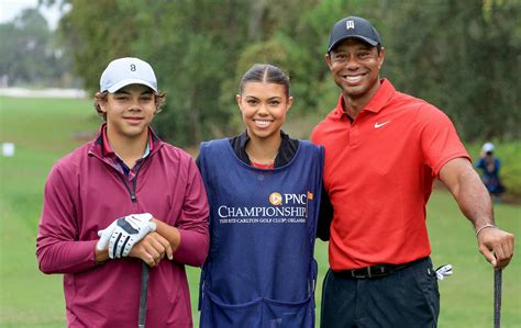 Tiger Woods' daughter Sam serves as his caddie for 1st time - ABC News