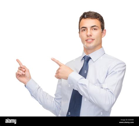 man pointing finger to something on virtual screen Stock Photo - Alamy