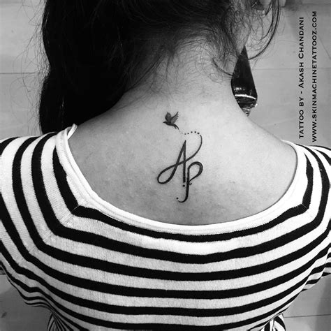 Initials A-P for her loved one. Tattoo designed by Akash Chandani @the ...