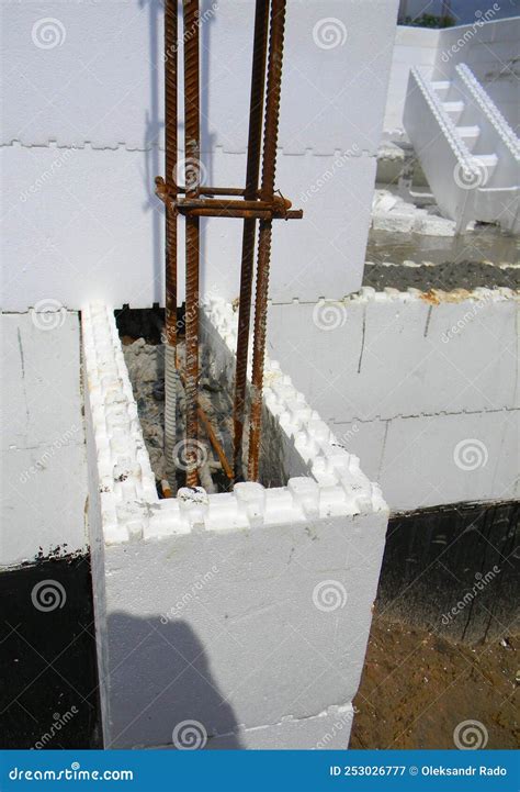 Insulated Concrete Forms Icf on House Construction. Close Up on Crowbars with Cement Concrete in ...