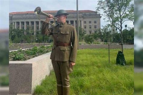 The World War I Memorial Has a Doughboy in Full Uniform Playing 'Taps ...