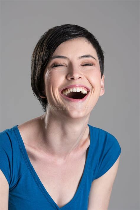 Studio Portrait of Heartily Laughing Young Cheerful Woman with Open Mouth Stock Photo - Image of ...