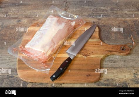 Vacuum packaging along with meat. Remove the piece of meat from the plastic vacuum packaging ...