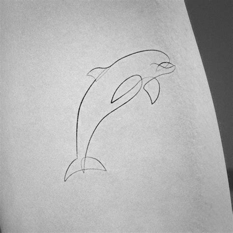 Minimal Dolphin Tattoo Design | Inku Paw