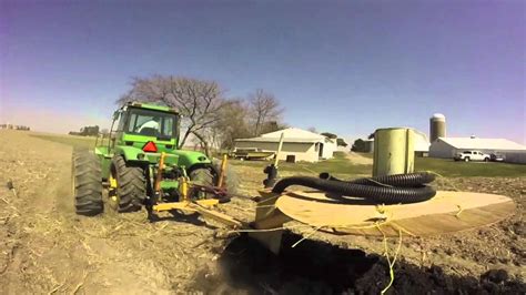 Installing Some Field Tile - YouTube