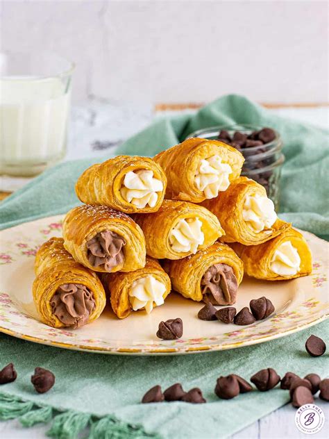 Flaky, golden brown puff pastries filled with a sweetened cream filling ...