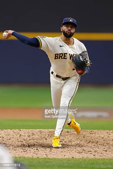 Milwaukee Brewers relief pitcher Devin Williams delivers a pitch ...