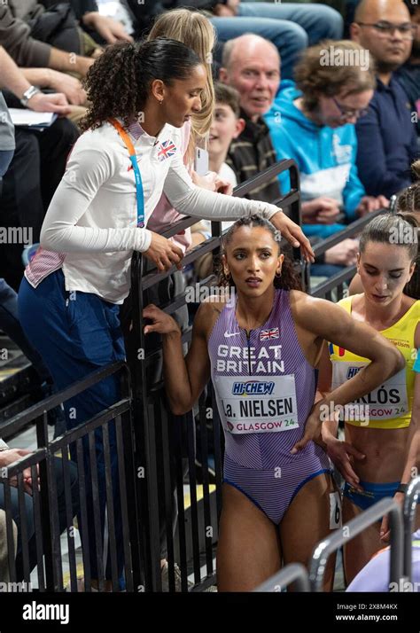 Laviai Nielsen of Great Britain talking to her twin sister Lina Nielsen ...