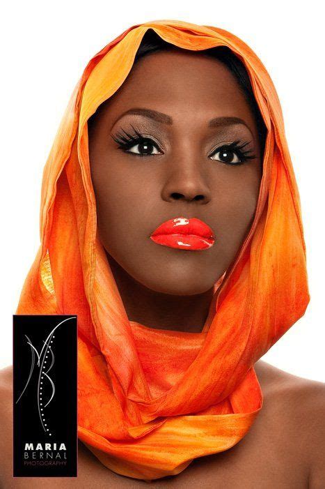 black woman | Orange lipstick, Dark skin makeup, Womens makeup